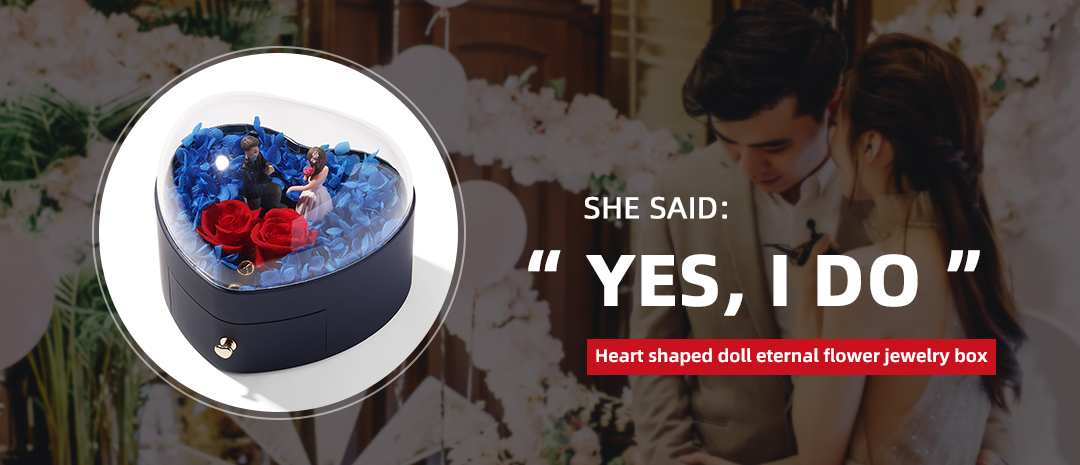 heart shaped jewelry gift box with eternal flower and dolls 